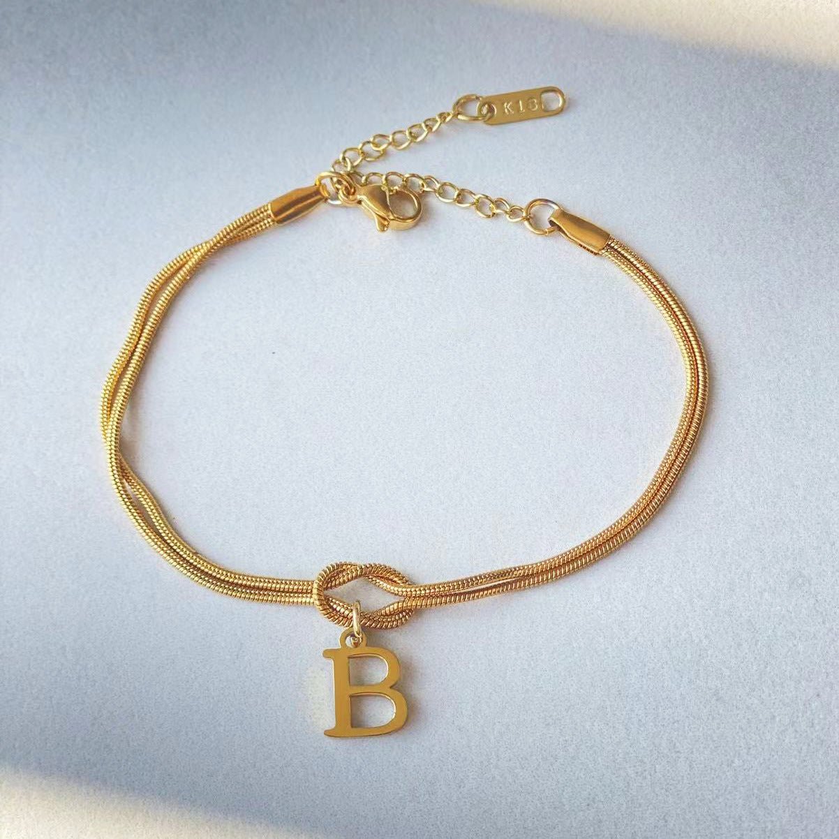 Bracciale con nodo d'amore e lettere - My kingdom