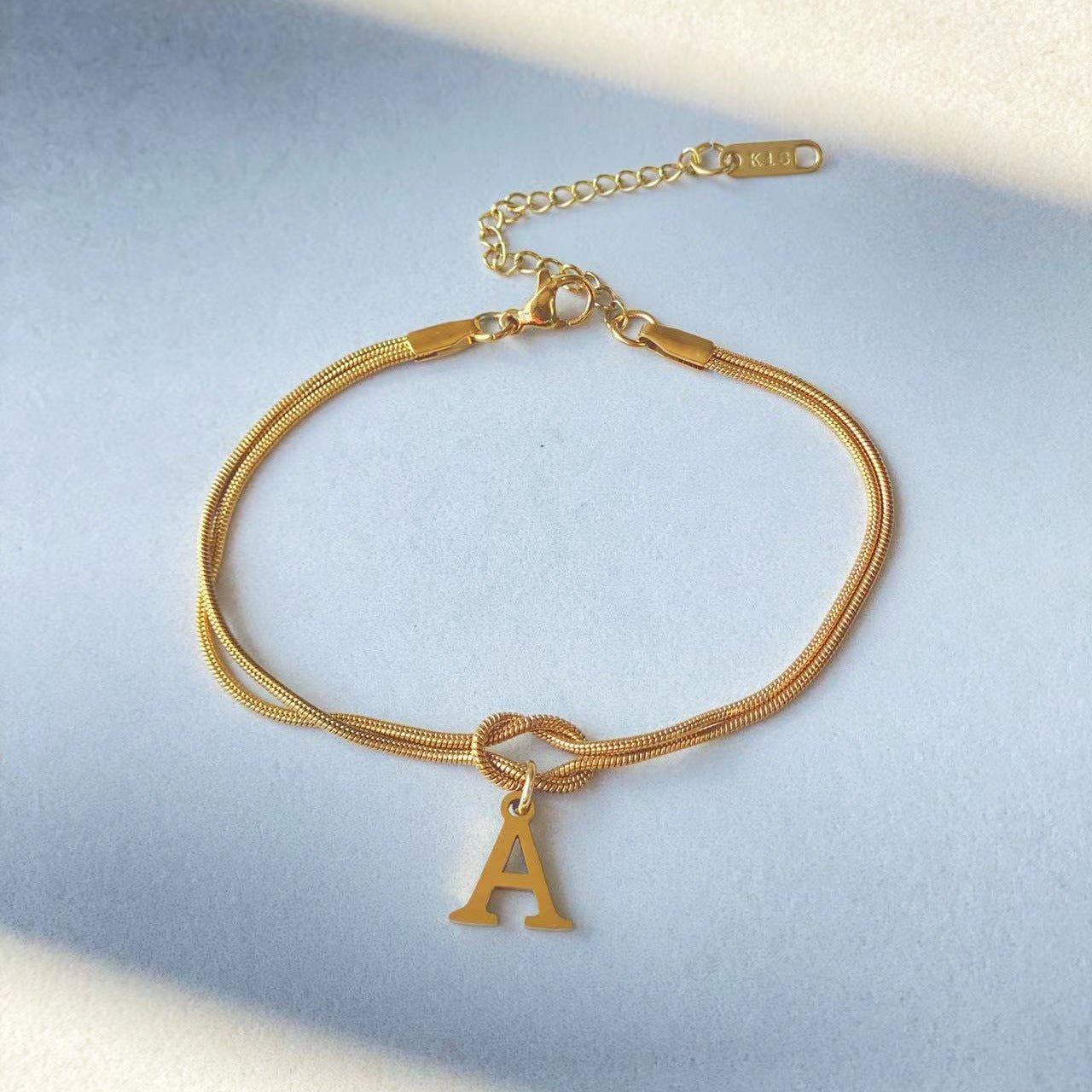 Bracciale con nodo d'amore e lettere - My kingdom